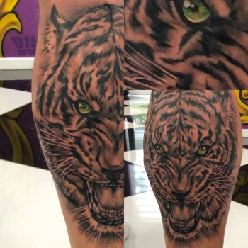 tattoo been tijger 